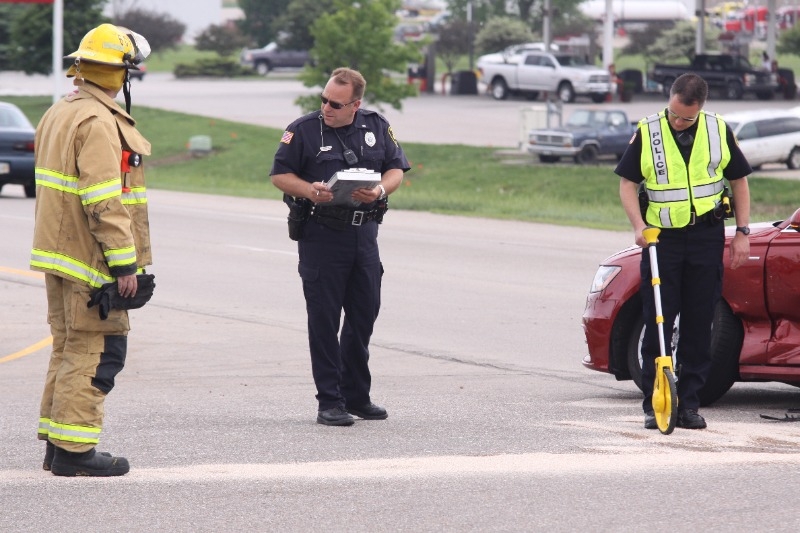 two police officers with firefighter