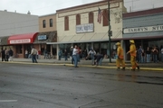 firefighters gathered outside building